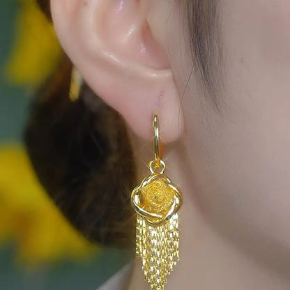 أقراط متدلية بتصميم زهرة ذهبية أنيقة